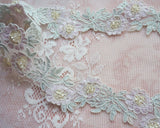 Embroidered trim with beads (5 motifs 45cm)