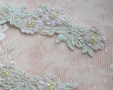 Embroidered trim with beads (5 motifs 45cm)