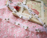 Organza ribbon and rose motif braid (25")