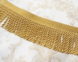 綺麗な光沢と、程よい太さのある滑らかな肌触りのブリオンフリンジです。 クッション、ソファー、スツールに飾ったり、手作りハンドバッグの飾りにも使えます。 綺麗なゴールドの色は、上品な飾りになります。アメリカの手芸用品、インテリア用フリンジ、ブレード、タッセルをアメリカから直送いたします。