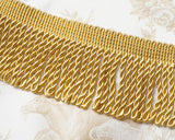 綺麗な光沢と、程よい太さのある滑らかな肌触りのブリオンフリンジです。 クッション、ソファー、スツールに飾ったり、手作りハンドバッグの飾りにも使えます。 綺麗なゴールドの色は、上品な飾りになります。アメリカの手芸用品、インテリア用フリンジ、ブレード、タッセルをアメリカから直送いたします。