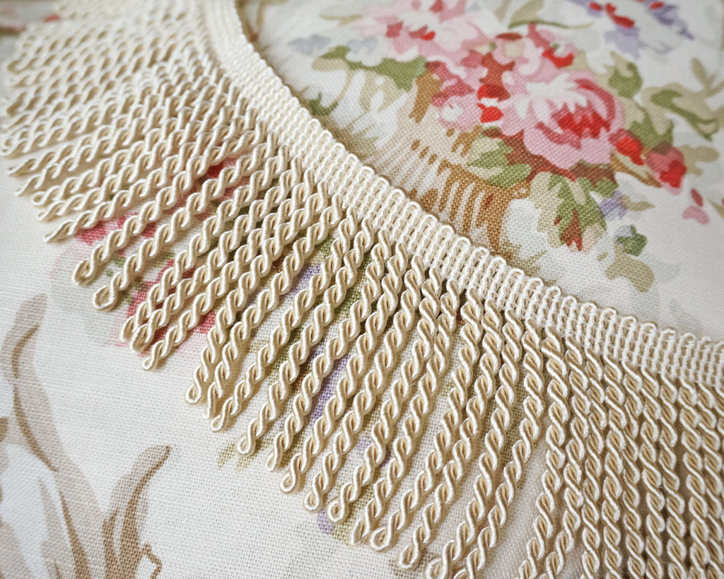 Classic ivory colored fringe tape