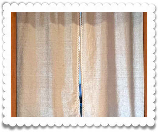 Curtain decorated with rick rack ribbon